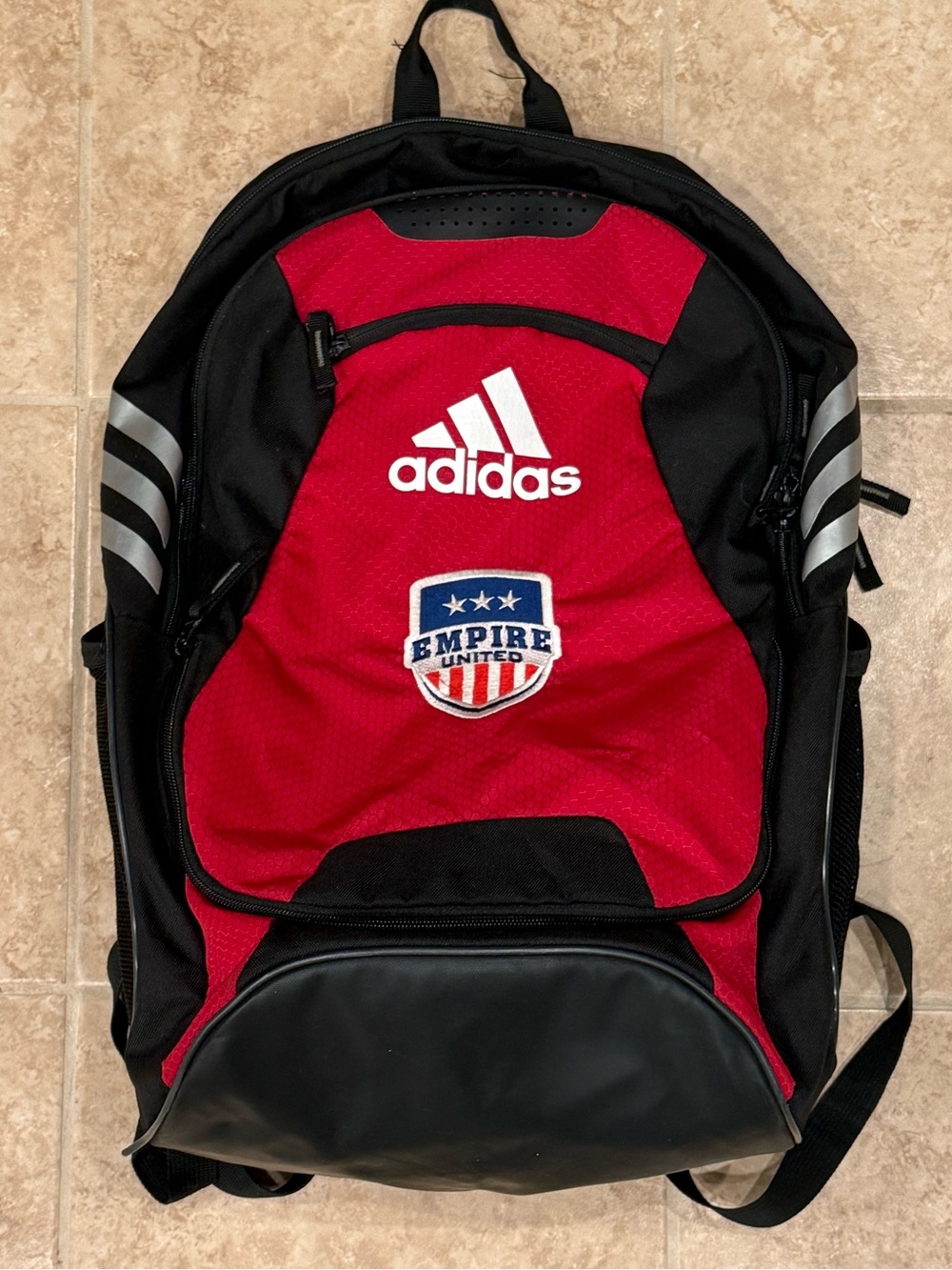 Adidas soccer sports backpack holds ball red and black